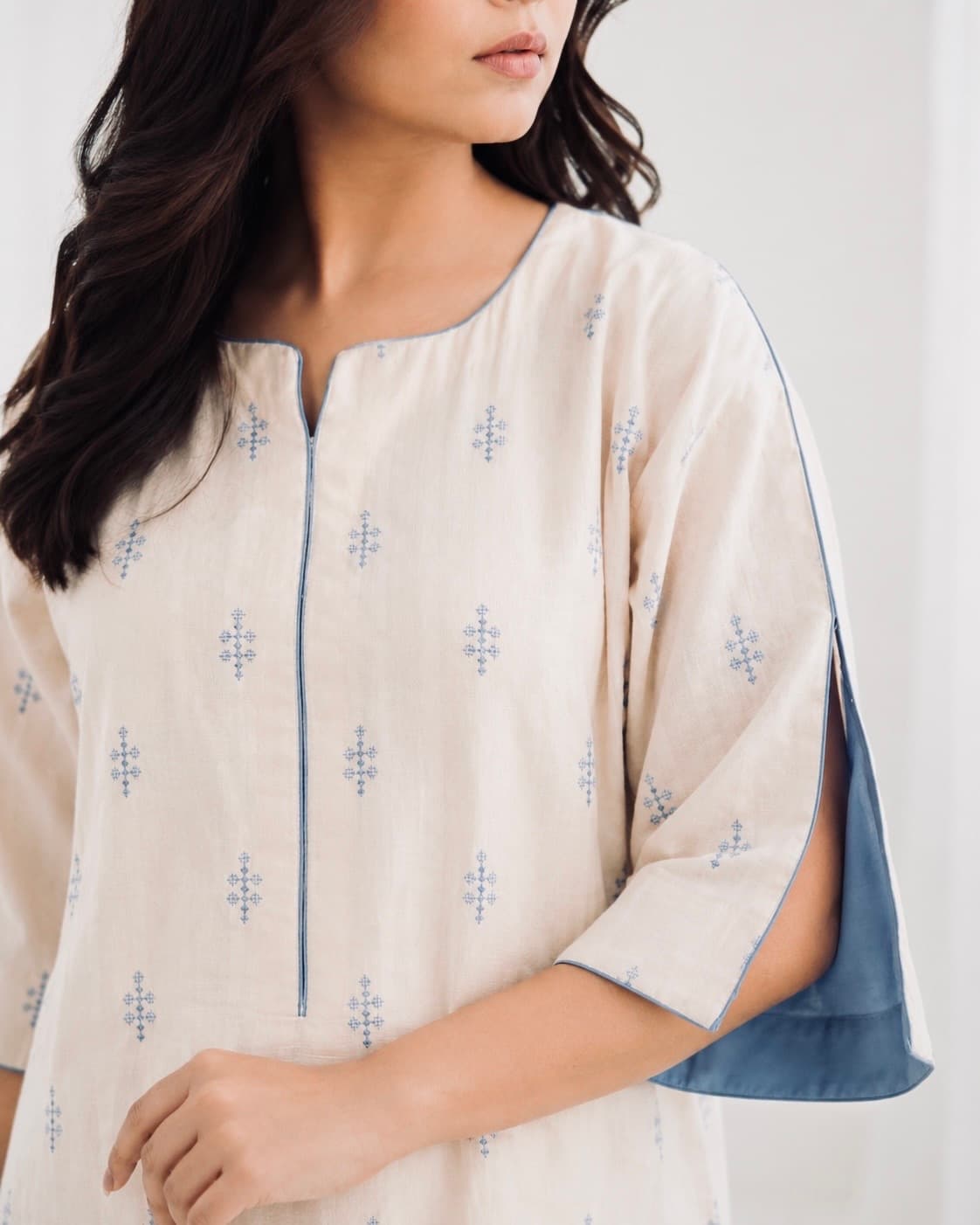 IVORY SKY ivory co-ord set front close-up, women 2-piece outfit fabric detail and fit.